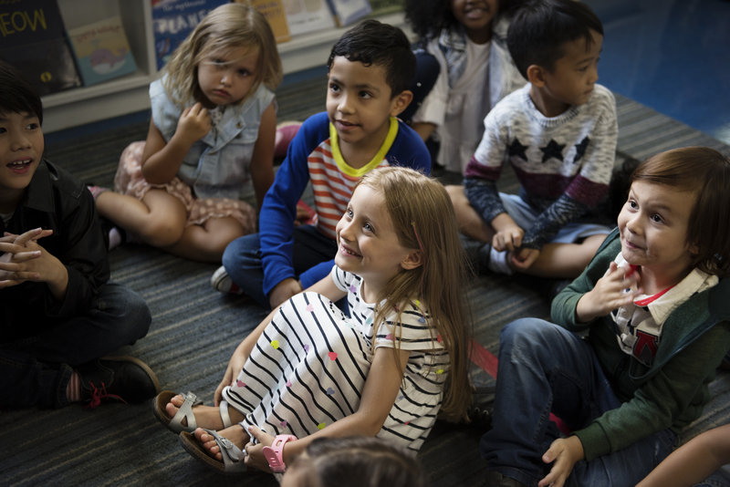 Kindergarten Students Sitting On The Floor Right Steps Education